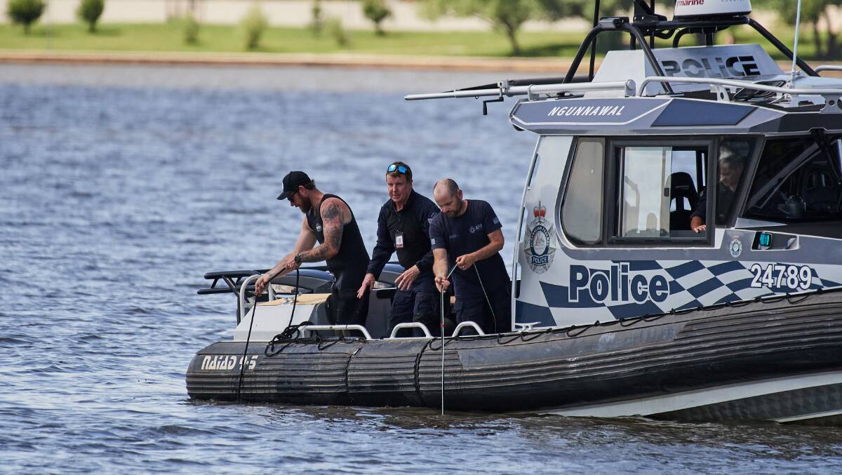 A police boat on Lake Burley Griffin on Monday morning. Picture: Matt Loxton