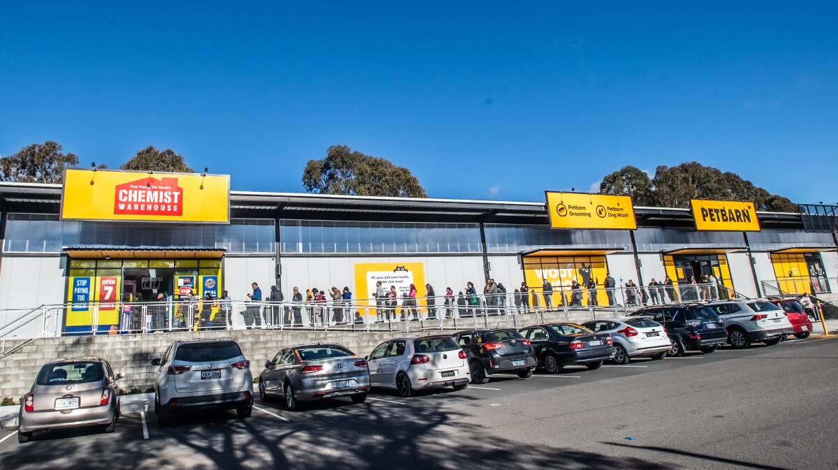 Queues form at the Chemist warehouse in Belconnen on the first day of the ChooseCBR voucher relaunch. Picture: Karleen Minney.