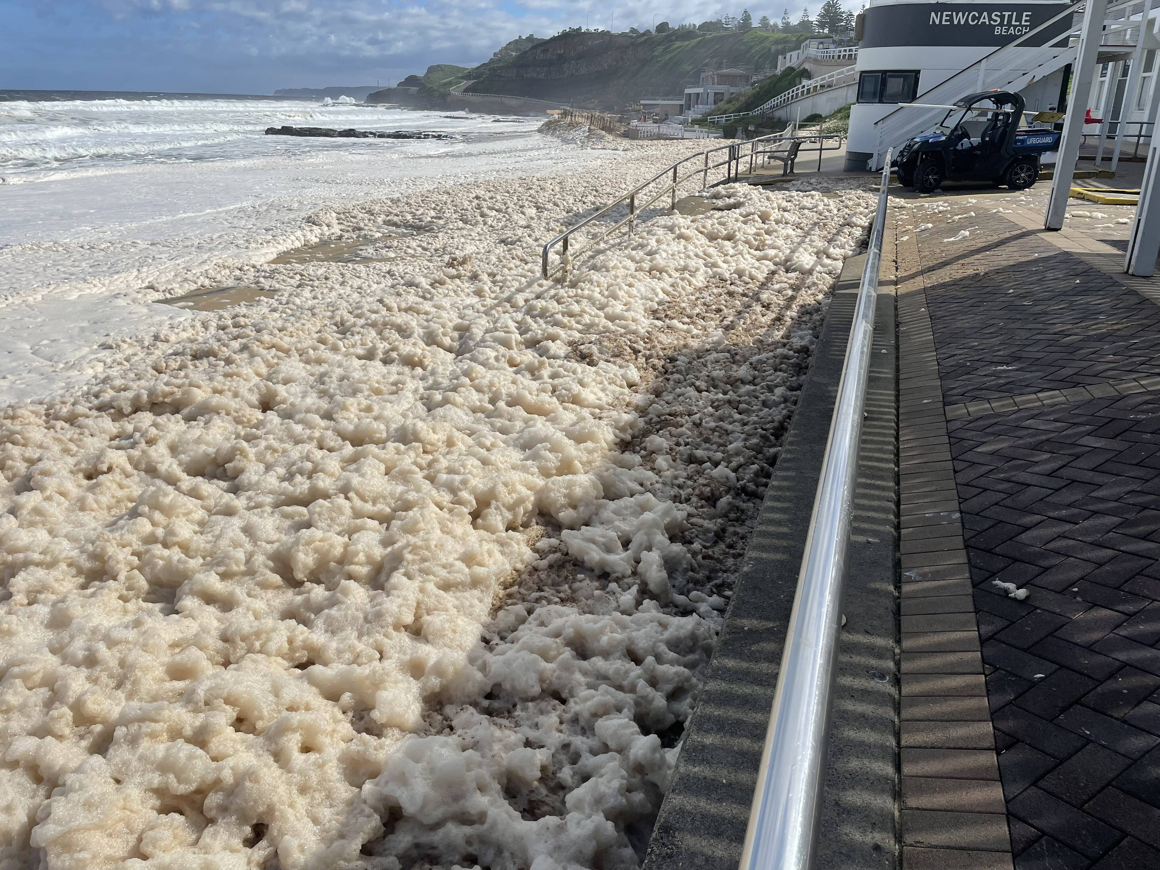 Sea foam swamps Australian beaches amid spell of extreme weather