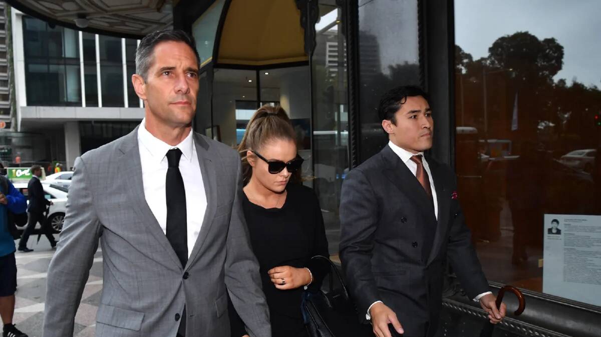 Roman Quaedvlieg arrives at the Downing Centre with his girlfriend, Sarah Rogers, and solicitor Bryan Wrench. Picture: JOEL CARRETT