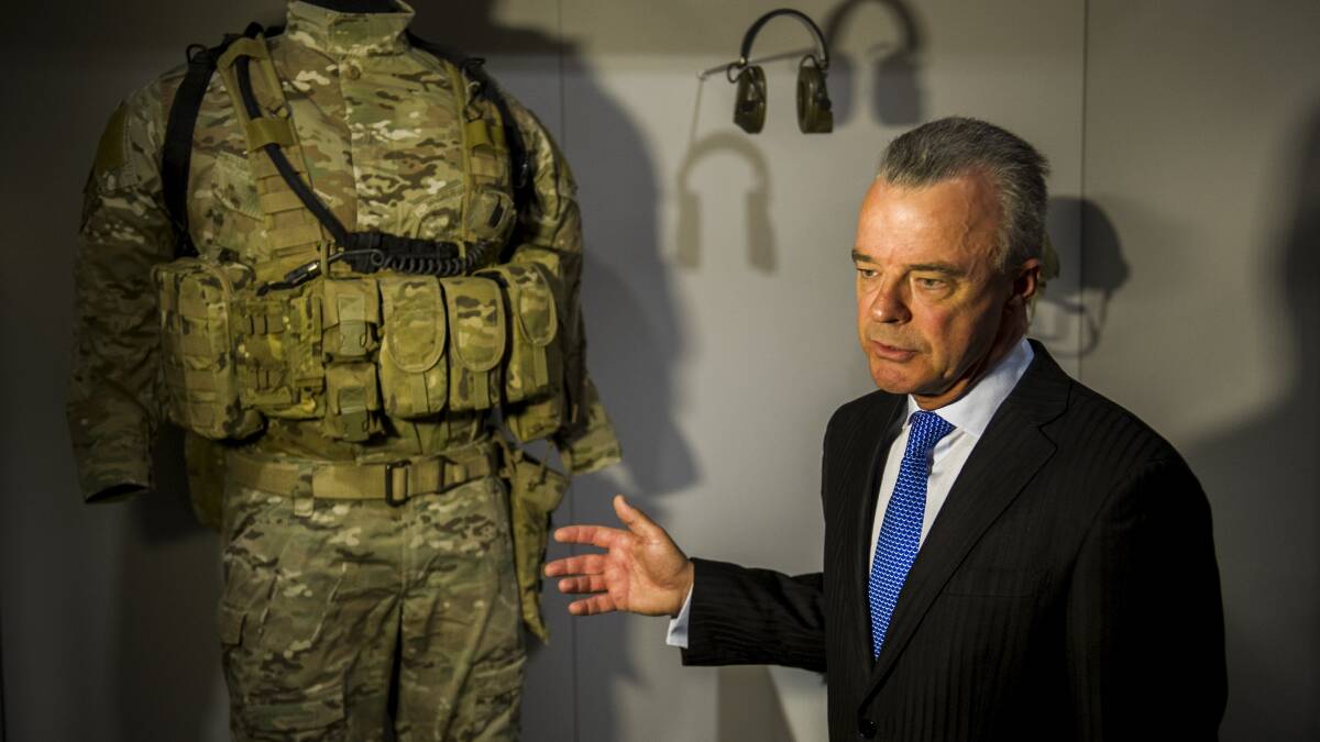 Former memorial director Brendan Nelson with items on display from Corporal Ben Roberts-Smith. Picture by Rohan Thomson