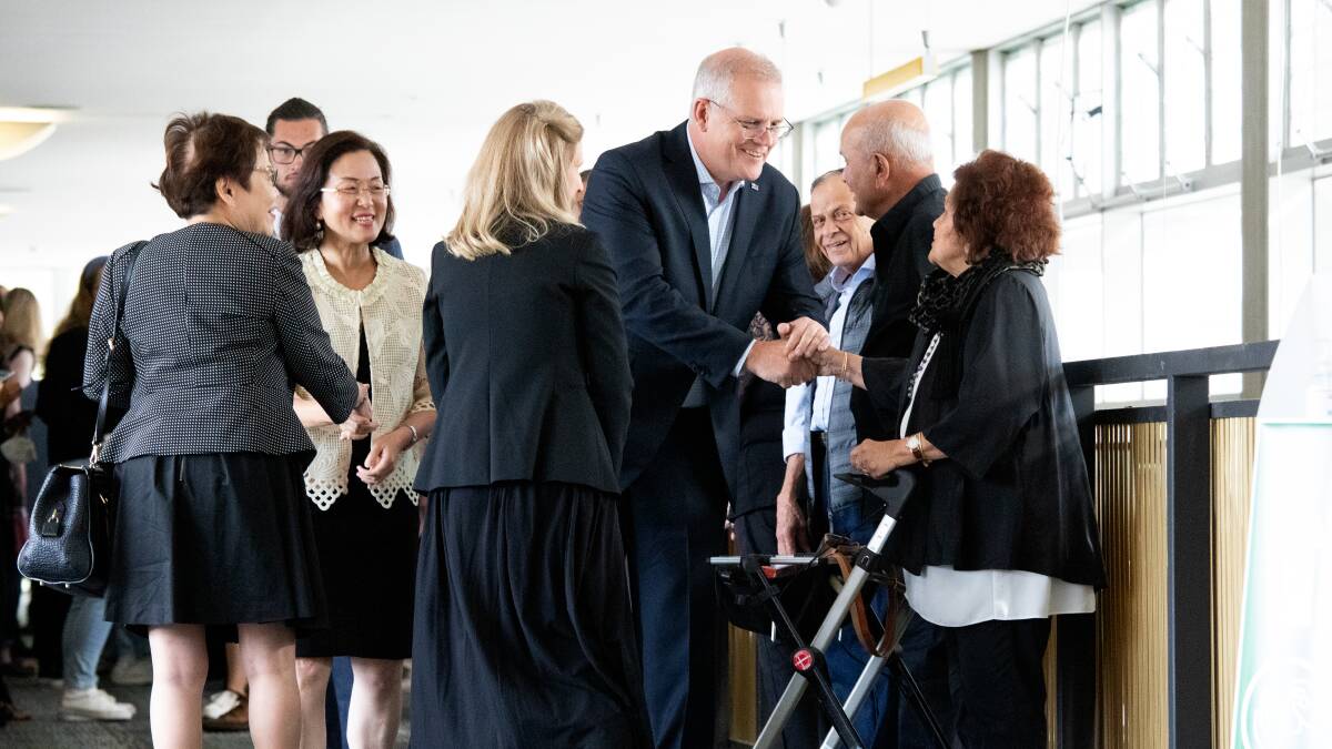 Member for Chisolm Gladys Liu and Prime Minister Scott Morrison meet worshippers after a Good Friday service at Syndal Baptist Church in the electorate of Chisolm in Melbourne. Picture: James Croucher