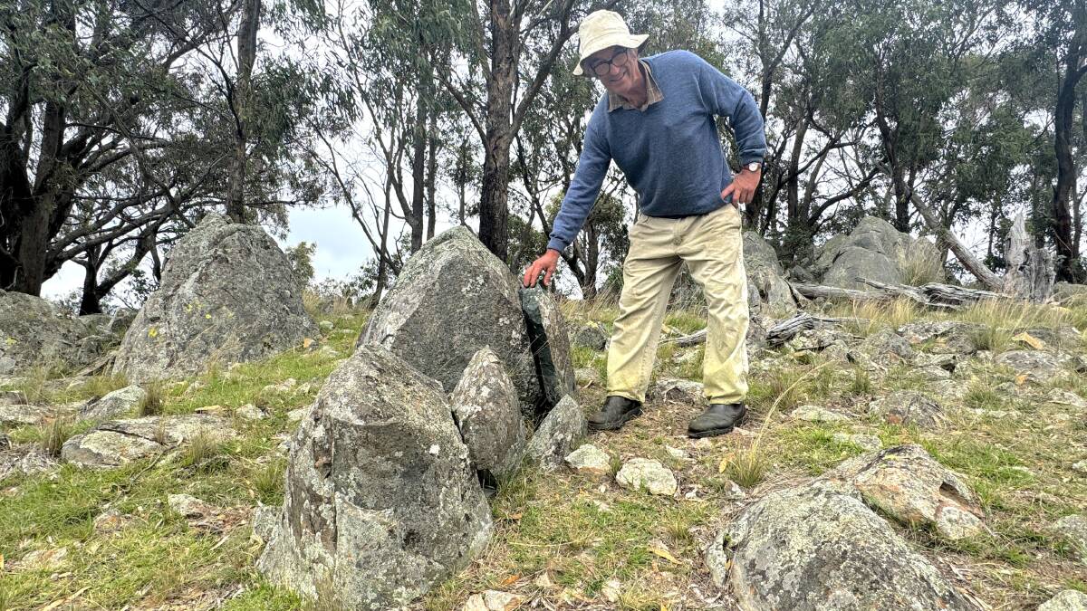 David Watson at the ancient stone axe quarry, atop a hill at Millpost. Picture by Tim the Yowie Man
