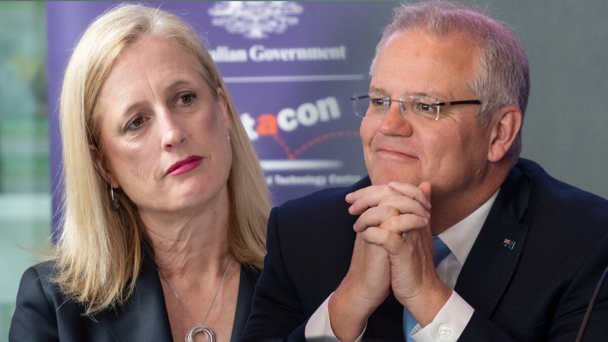 Finance Minister Katy Gallagher and former prime minister Scott Morrison. Pictures by Karleen Minney and Phillip Biggs