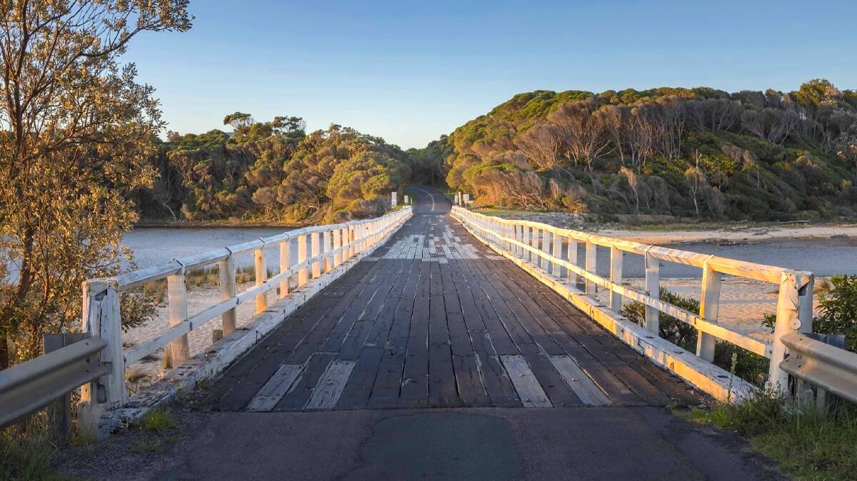 Listen for the thud, clank and jingle as you cross the Cuttagee Bridge, one of five famous wooden bridges between Wallaga Lake and Tathra. Picture: David Rogers