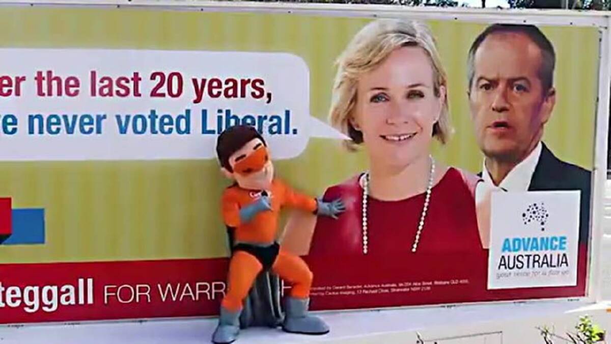 A screen shot from the video originally posted on twitter by @CaptGetUp appears to show the conservative mascot rubbing up against an election poster of Zali Steggall.