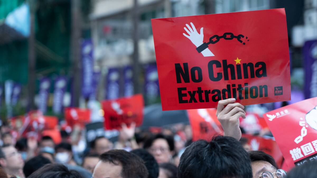 People in Hong Kong protest against a new Chinese extradition law. Picture: Shutterstock