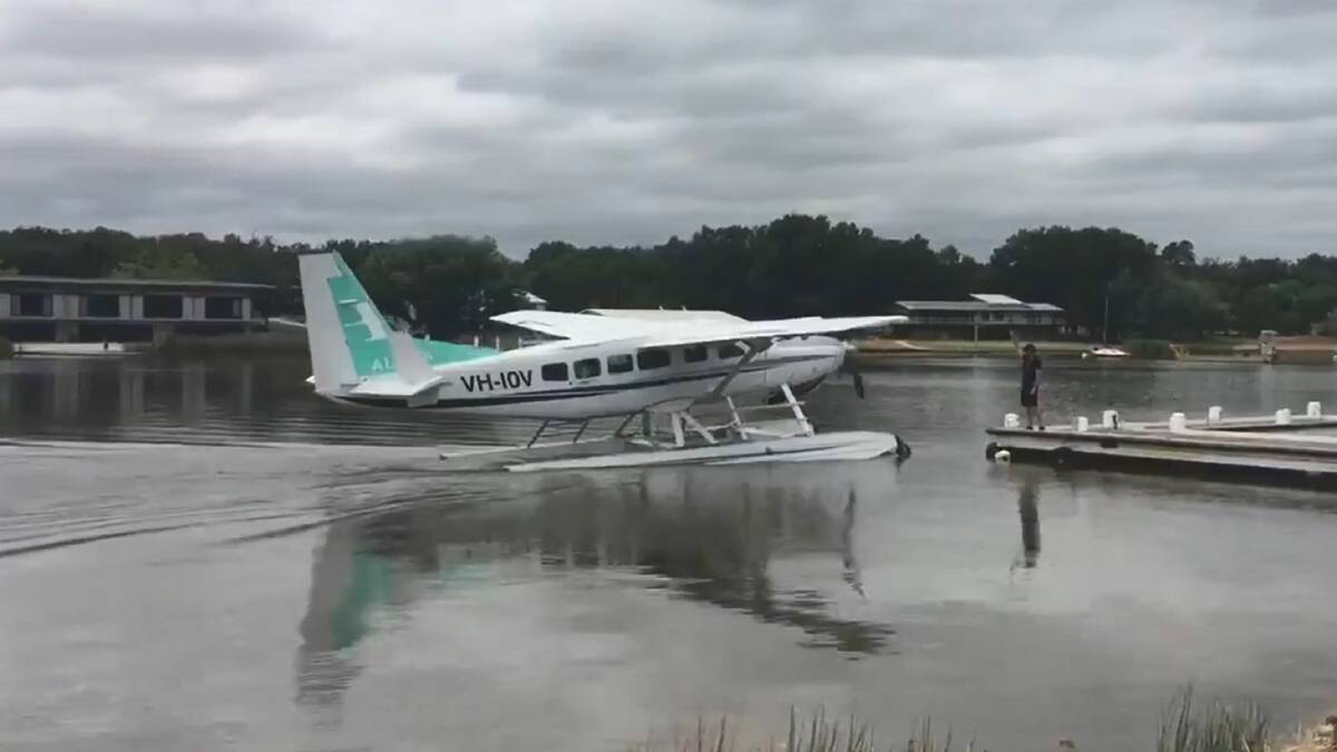 The seaplane lands in Canberra. Picture: Kathryn Lewis