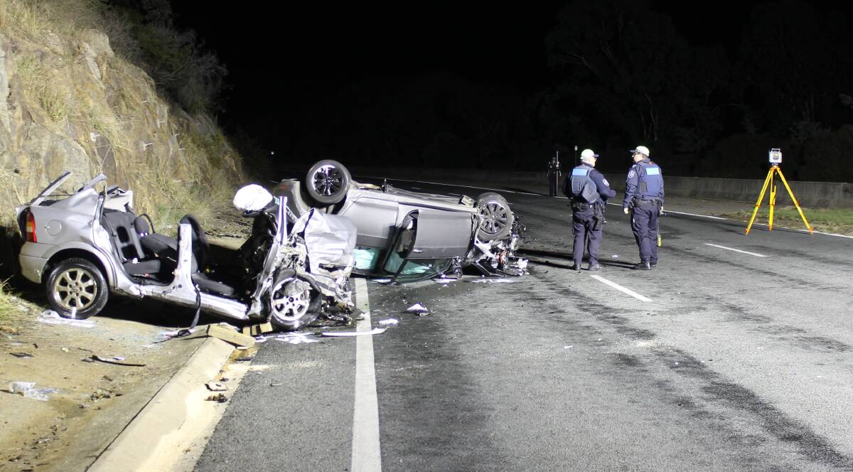Police investigators at the horrific scene of the head-on crash on Hindmarsh Drive. Picture: ACT Policing 