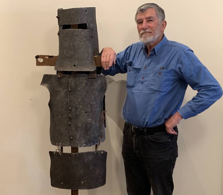 Peter Smith at the Braidwood Museum with the armour worn by Mick Jagger in the 1970 film 'Ned Kelly'. Picture: Tim the Yowie Man