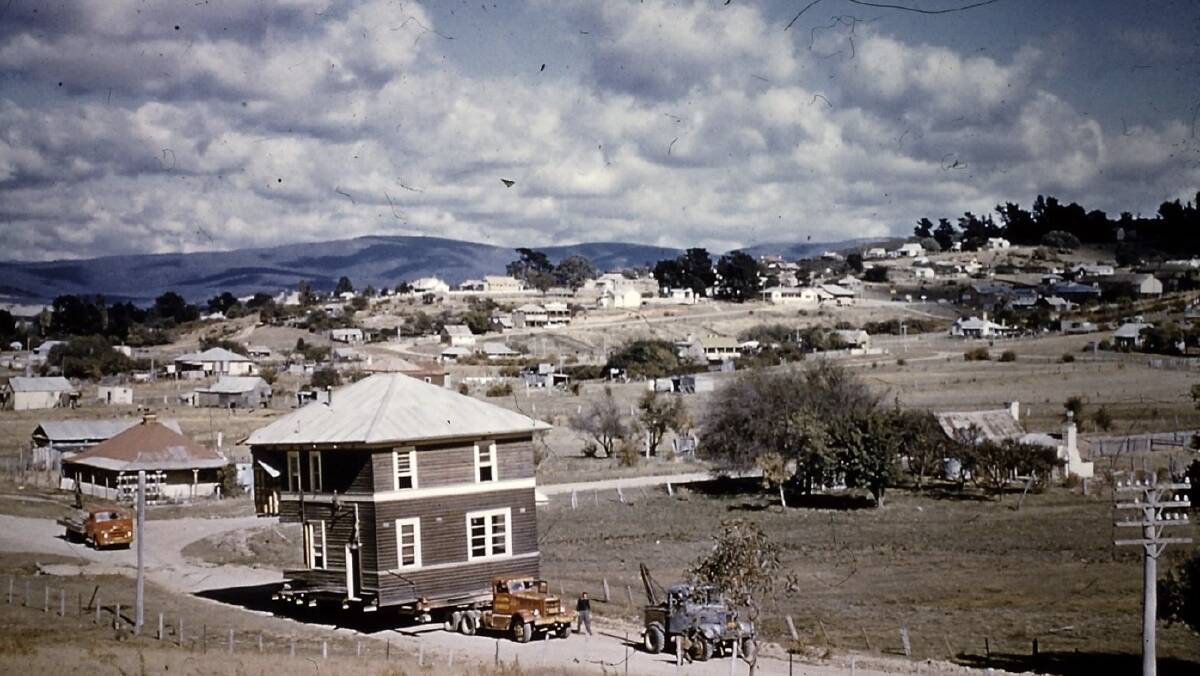 The CBC Bank building leaves old Adaminaby prior to the town being flooded by Lake Eucumbene in the 1950s. Picture by Snowy Mountains Authority/Snowy Hydro