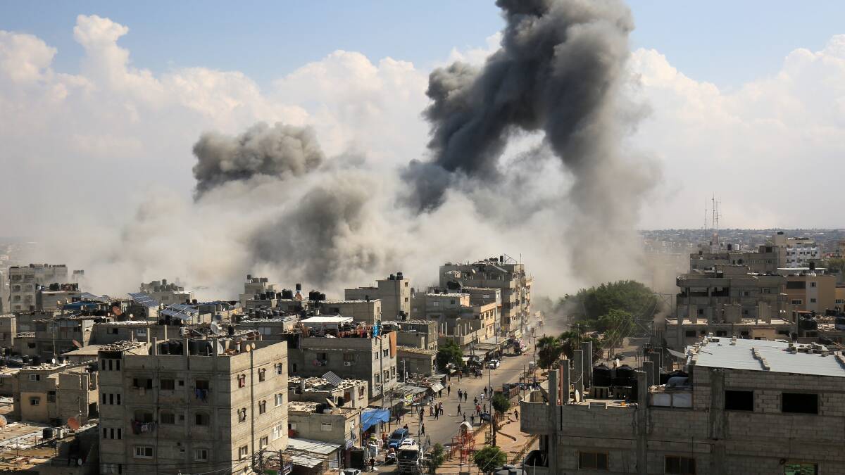 Smoke rises after Israeli air strikes of the city of Rafah in the southern Gaza Strip on October 10. Picture Shutterstock