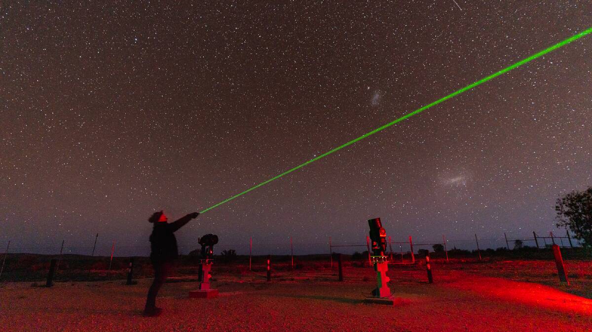 Linda Nadge points to the stars at Outback Astronomy. Picture: Michael Turtle