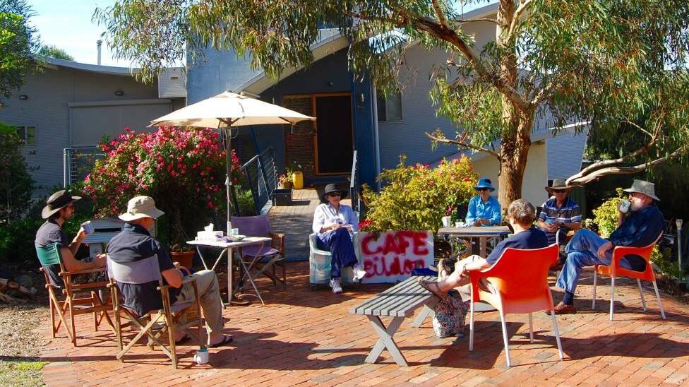 A meeting at "Cafe Eildon", in Eildon Place, Duffy, where neighbours come together, apart. Picture: Supplied