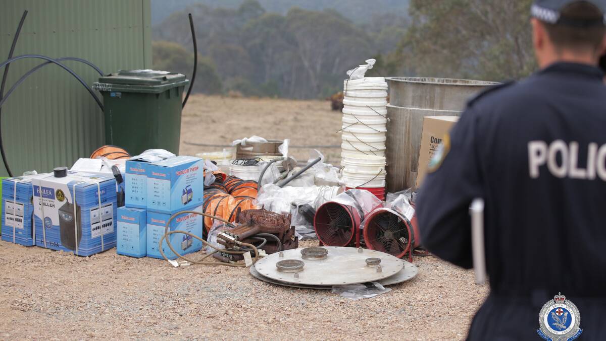 Police said they found a large-scale clandestine laboratory spread across two sheds on the property. Picture: NSW police
