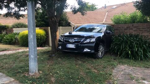 Two teenage boys will face court after a stolen vehicle crashed into the front yard of a Nicholls home on Sunday morning. Picture supplied.