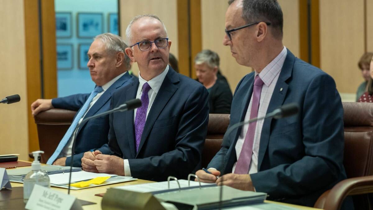 AEC commissioner Tom Rogers, left, and his deputy Jeff Pope at estimates. Picture Gary Ramage