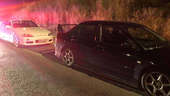 The white Nissan Skyline and black Mitsubishi Evolution caught speed racing. Picture: ACT Policing