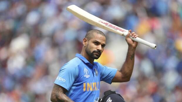 India's Shikhar Dhawan acknowledges the applause from the crowd as he leaves the field after losing his wicket. Picture: AP