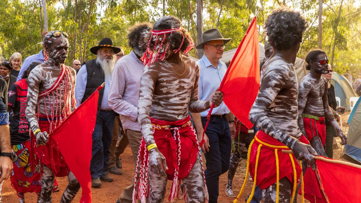Prime Minister Anthony Albanese walks with Yolngu community during the Garma Festival earlier this year. Picture Getty Images