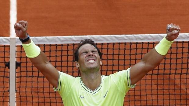 Spain's Rafael Nadal celebrates his record 12th French Open tennis tournament title. Picture: AP