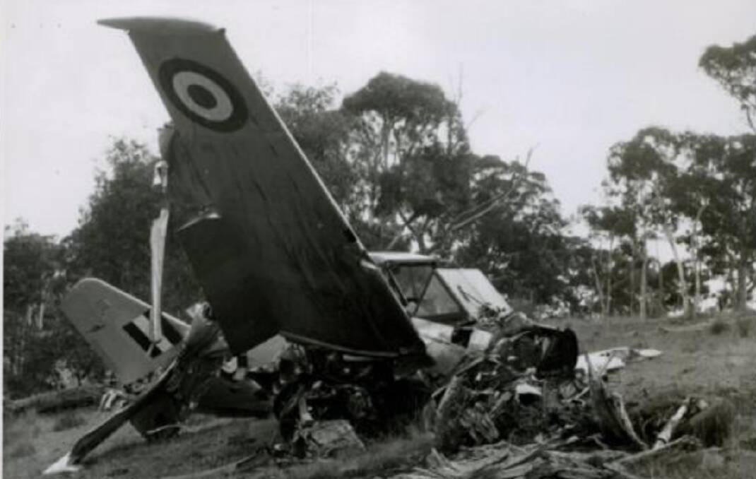 Wreckage of Winjeel A85-419, the engine torn off and resting under the starboard wing root. Picture RAAF