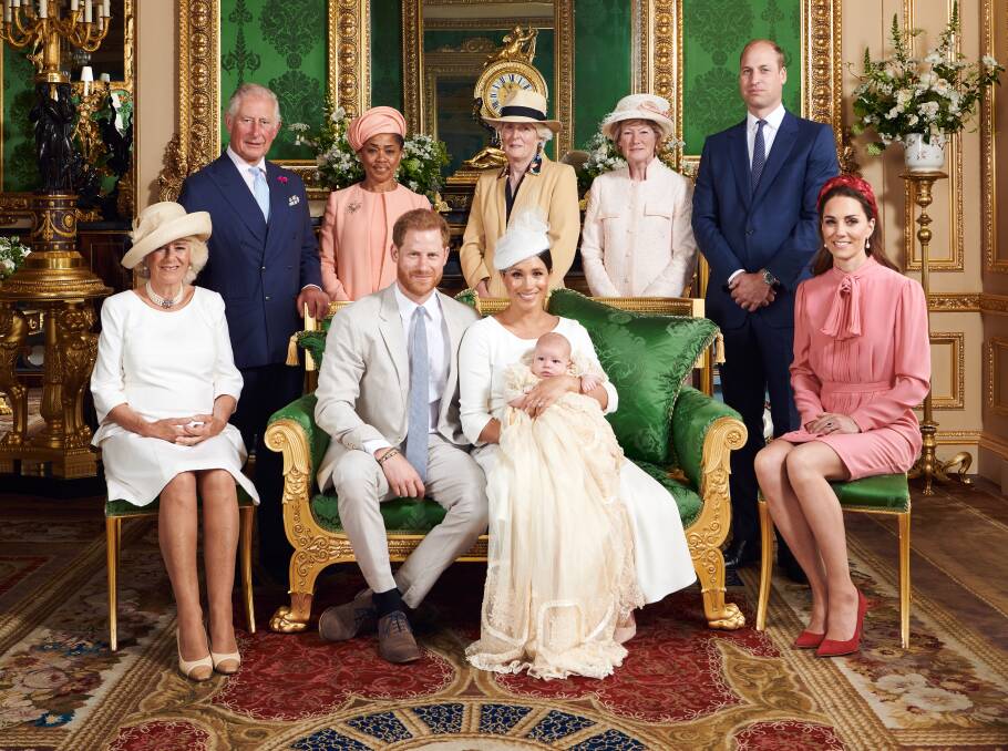 This official christening photograph released by the Duke and Duchess of Sussex shows the Duke and Duchess with their son, Archie and (left to right) the Duchess of Cornwall, The Prince of Wales, Ms Doria Ragland, Lady Jane Fellowes, Lady Sarah McCorquodale, The Duke of Cambridge and The Duchess of Cambridge in the Green Drawing Room at Windsor Castle. Picture: Chris Allerton/Sussex Royal