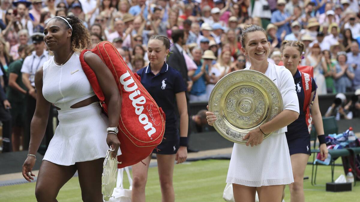 Serena Williams, left, and Simona Halep after the women's singles Wimbledon final. Picture: AP
