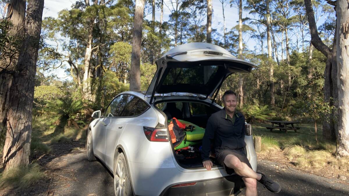 Simon Bradshaw and his rented EV. Picture supplied