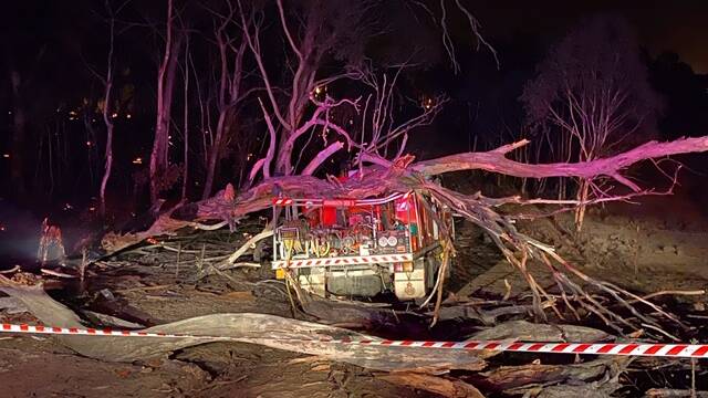 Trees fell on the truck. Picture: NSW RFS