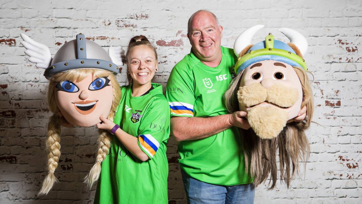 More modern times ... Canberra Raiders mascot's Emily Gageldonk (Velda the Valkyrie), and Tony Wood (Victor the Viking). Picture: Jamila Toderas