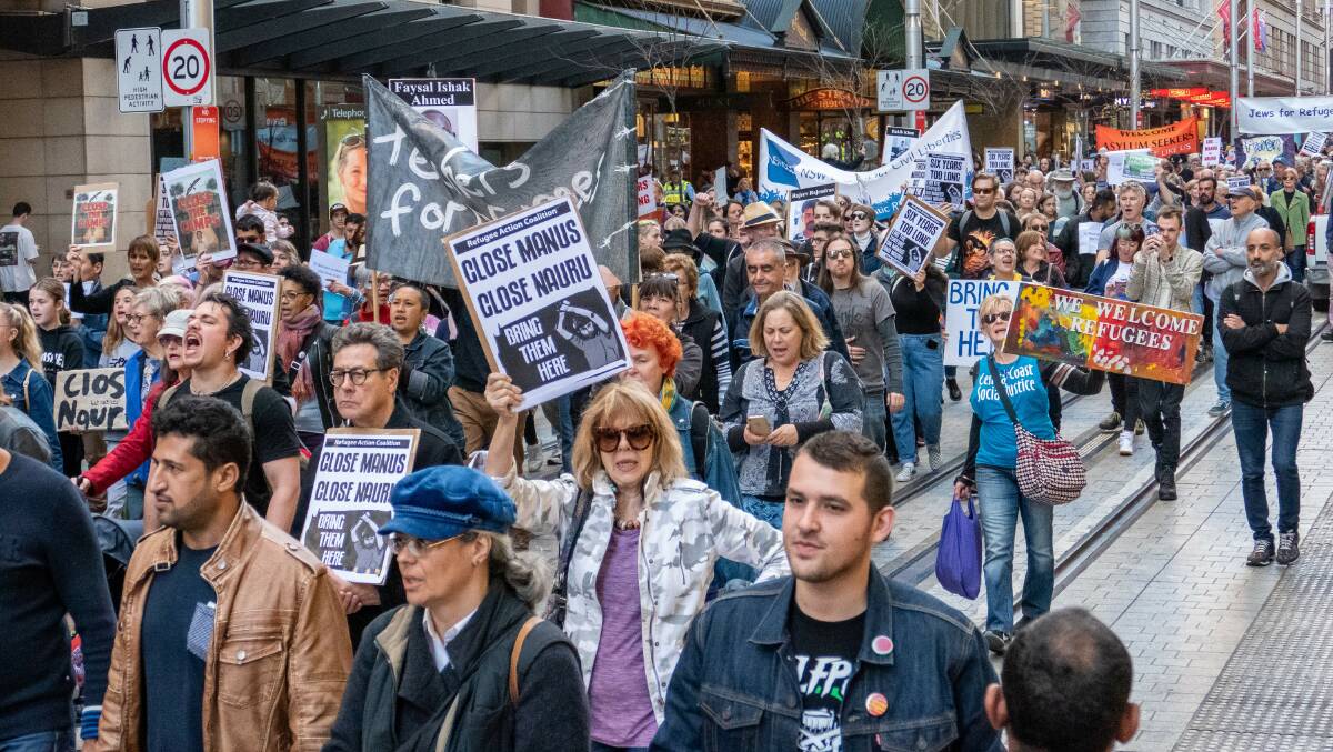 Protesters march through Sydney calling for the Australian government to close the refugee camps on Manus and Nauru islands in 2019. Picture Shutterstock