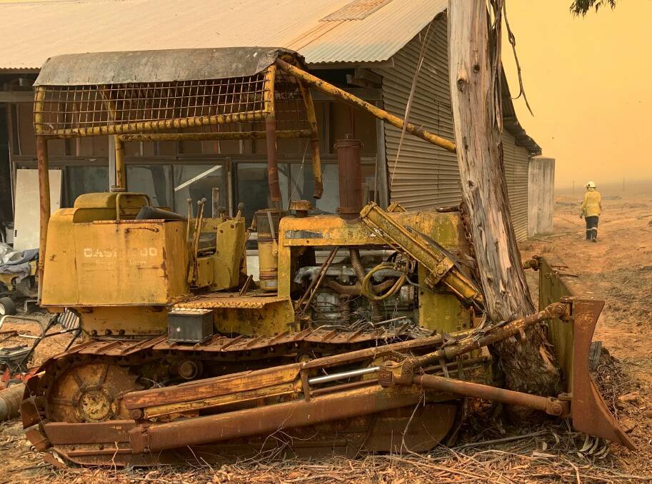 How long has this bulldozer been parked here? Picture by David Hanzl