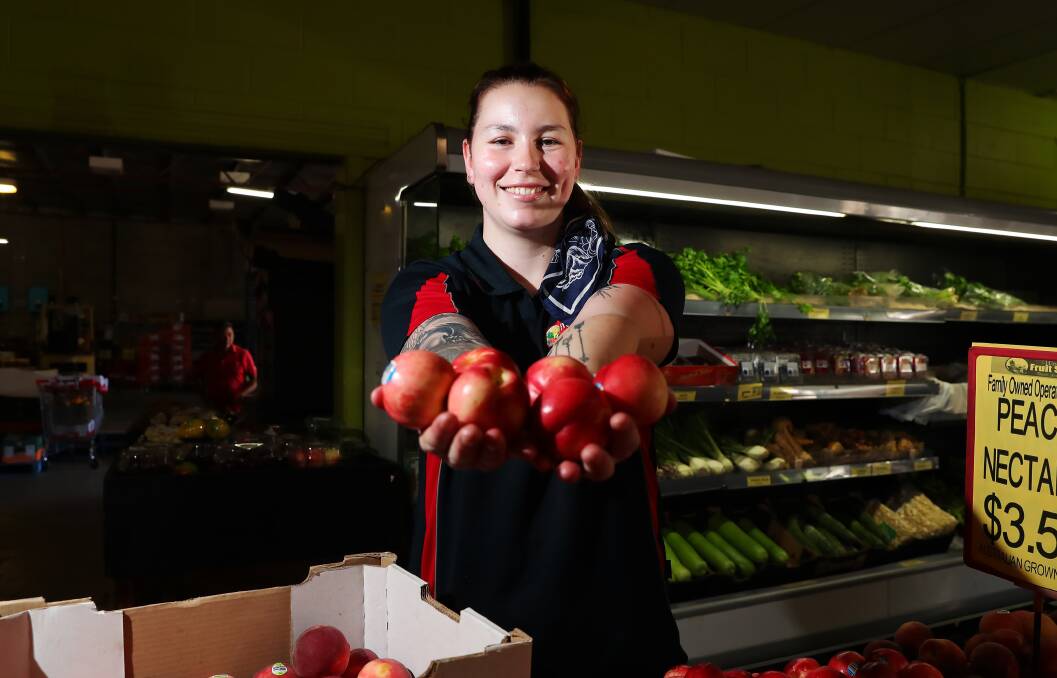 GOING STEADY: Savanna Lavis sells fruit as Wagga Fruit Supply which hasn't yet felt the impact of the farm labour shortage. Picture: Emma Hillier