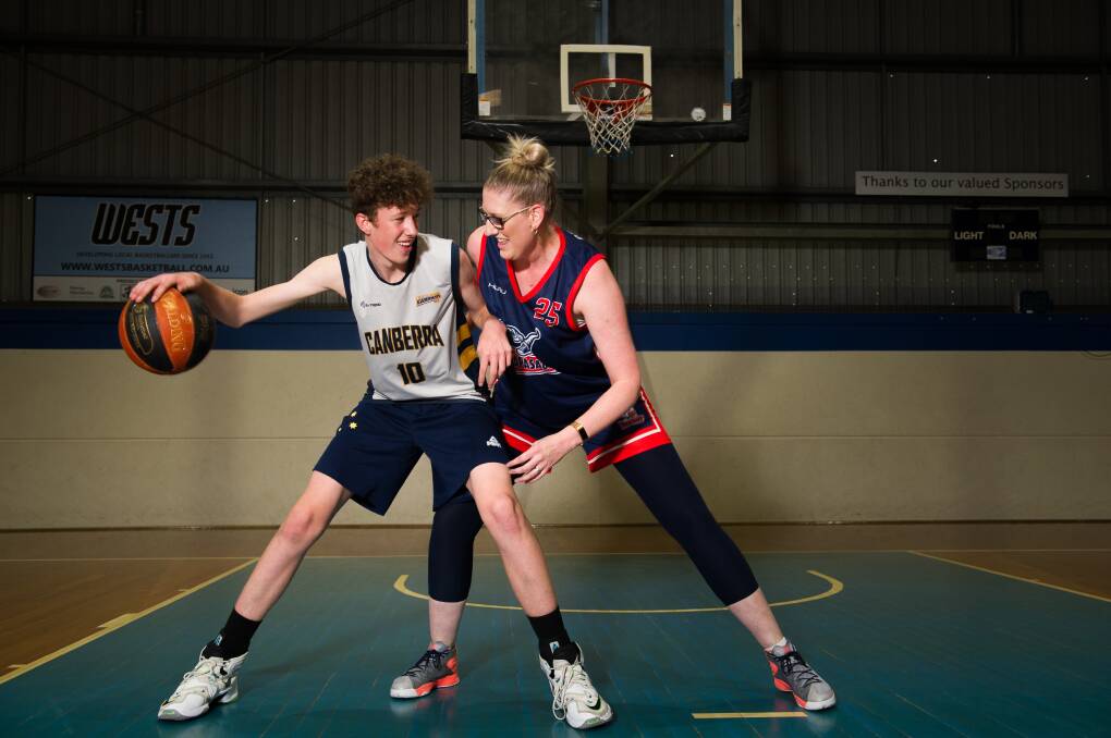 Bowyn Beatty, pictured with his former Canberra Capitals mother Tracey Peacock, has been selected for the NBA Global Academy scholarship. Picture: Elesa Kurtz
