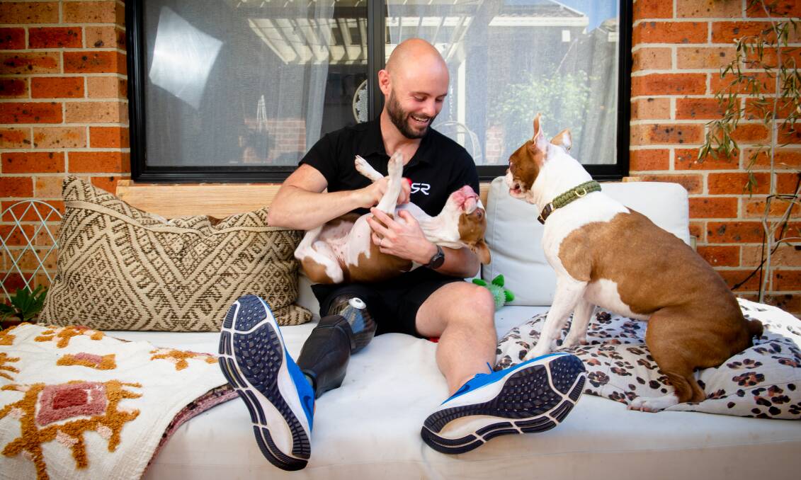 Canberra sprinter Scott Reardon has retired from athletics, following the Paralympics in Tokyo, and plans to spend more time with his gold medalist wife Vanessa Low, and dogs Milo and Milka. Picture: Elesa Kurtz