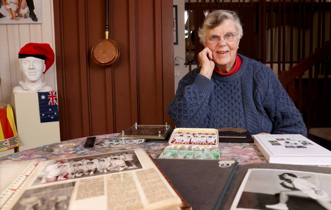 AM recipient Barbara Slotemaker de Bruine with some of her photos, records and memories off her squash days. Picture: James Croucher