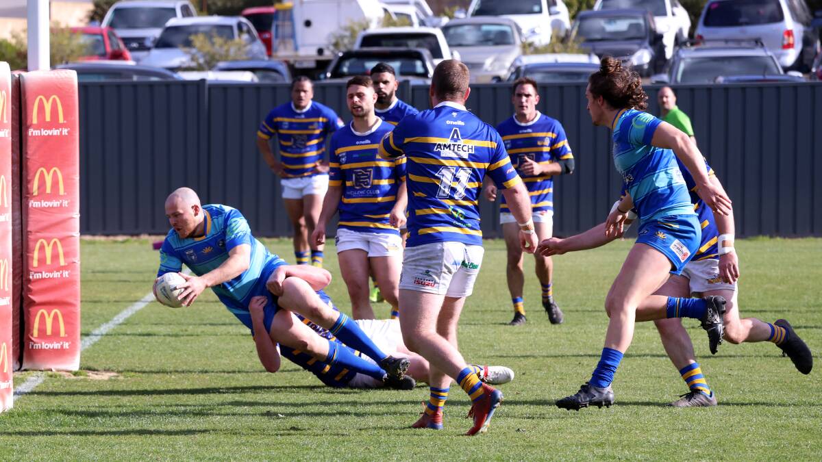 West Belconnen Warriors scoring one of their eight tries on Sunday. Picture by James Croucher