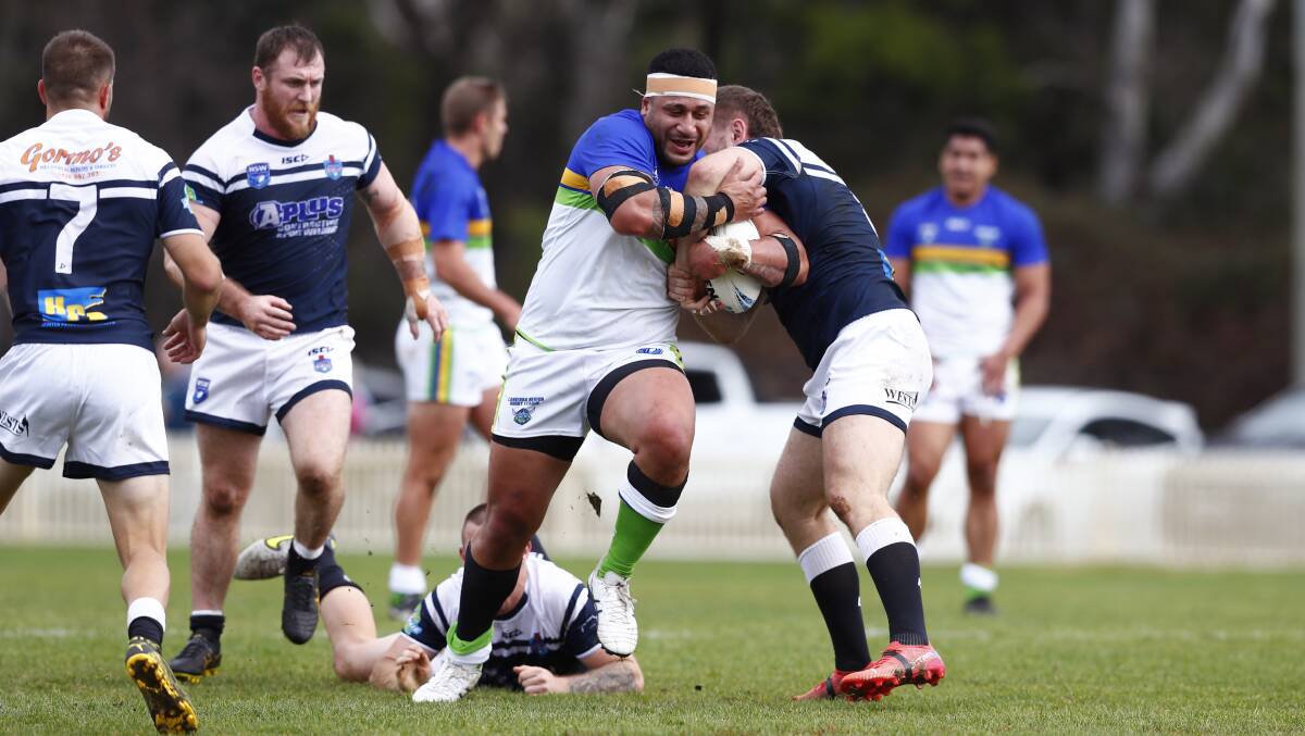 Canberra Raiders Cup representative side's Atu Tupou runs into the Newcastle defence on Saturday. Picture: Keegan Carroll