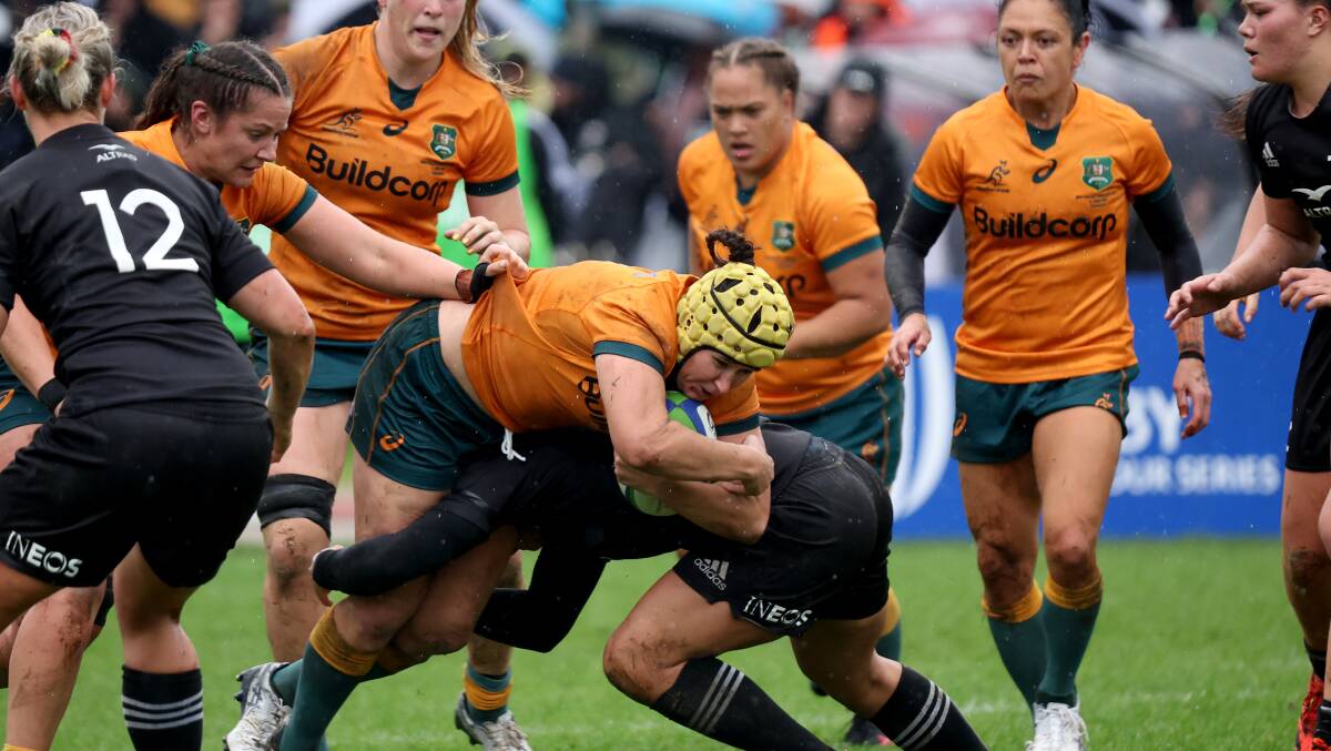 Skipper Shannon Parry is tackled on Monday during the Wallaroos loss to the Black Ferns. Picture: Getty