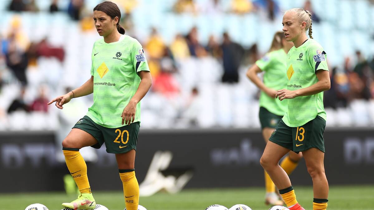 Sam Kerr and Tameka Yallop during the warm-up of Saturday's match before their 3-0 loss. Picture: Getty