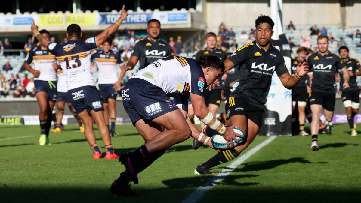 Tom Banks crosses for a try in the Brumbies' 17-point win. Picture: James Croucher