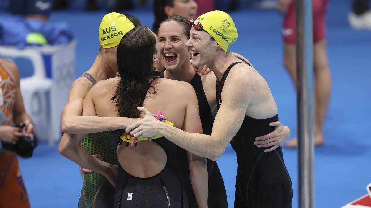 Bronte and Cate Campbell celebrate their Olympic gold medal win in the 4x100m freestyle relay in Tokyo with Emma McKeon and Meg Harris. Picture: Getty Images