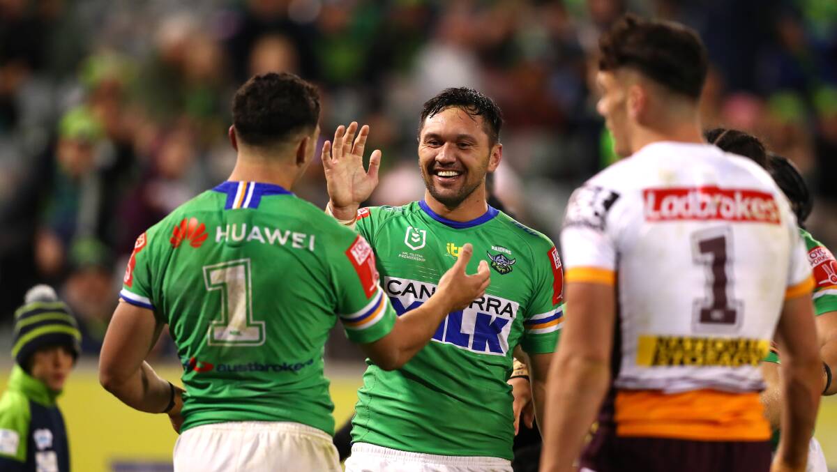 Canberra Raiders players Jordan Rapana and Bailey Simmsson high five after their win on Saturday. Picture: Keegan Carroll
