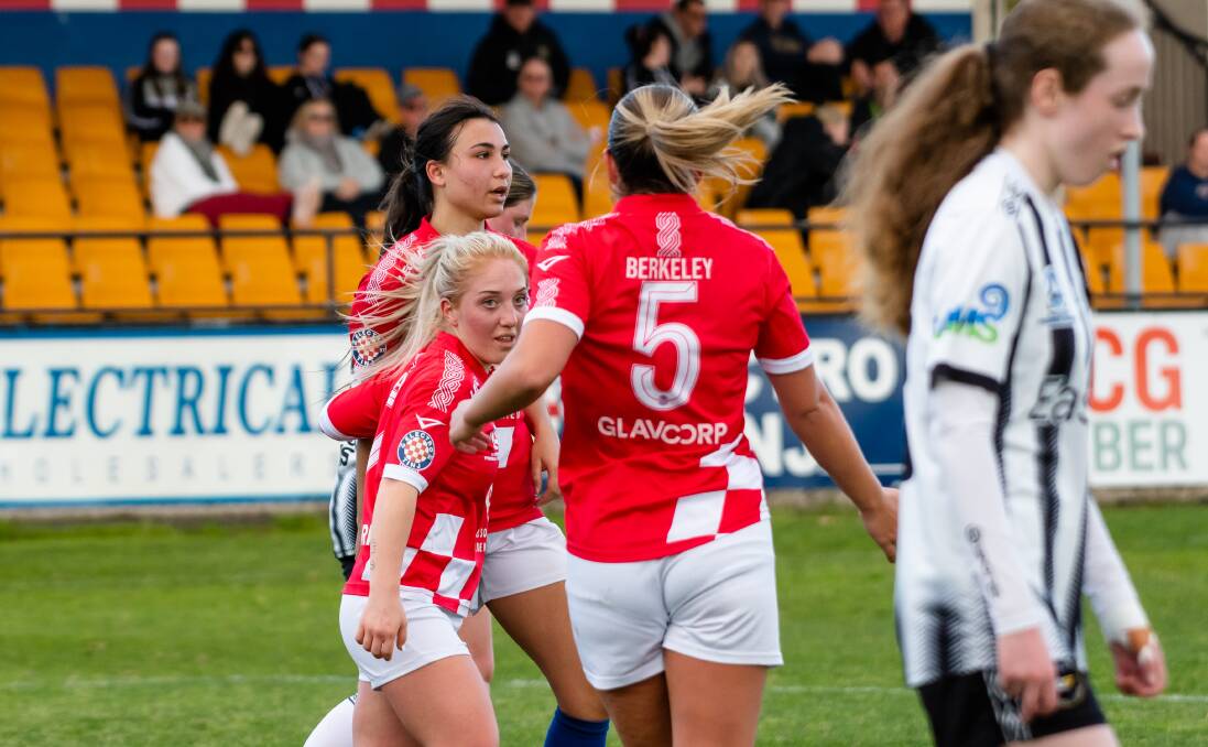 Canberra Croatia's Bella Barac celebrates her goal on Saturday with her teammates. Picture by Elesa Kurtz
