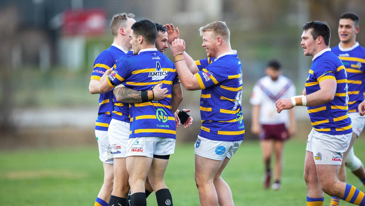 Woden Valley Rams celebrate Jesse Taws try on Saturday. Picture: Sitthixay Ditthavong