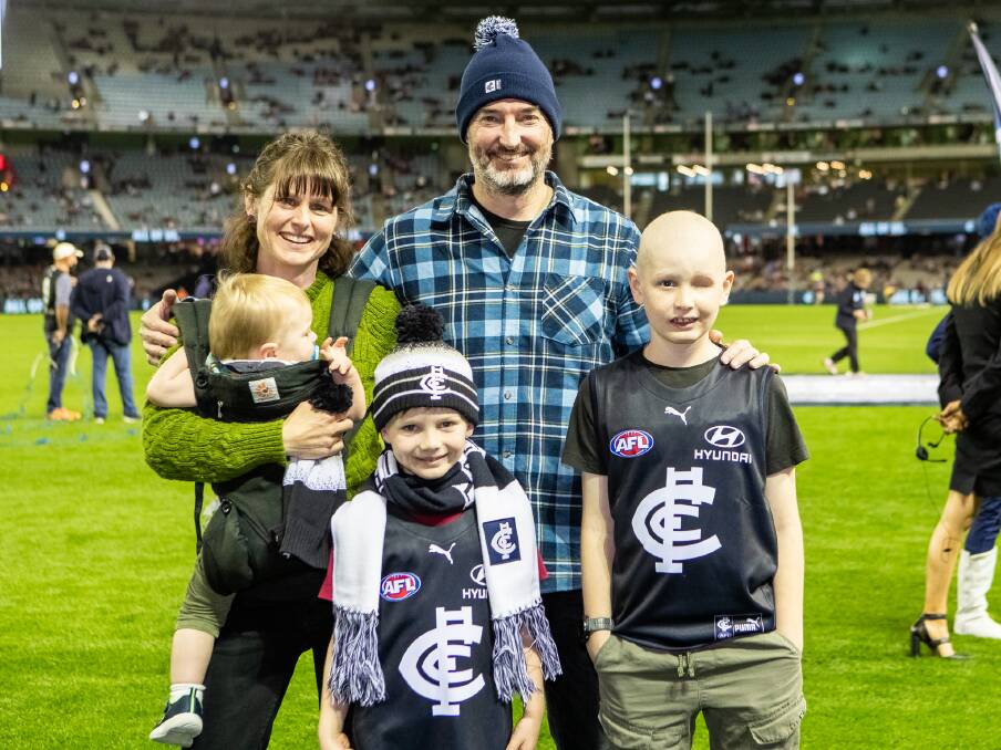 Zac Minty (right) with his mother Rebecca Minty, father Jim Leitch, and brothers Elliott Minty, 7, and Sebastian Minty, 14 months. Picture: Supplied