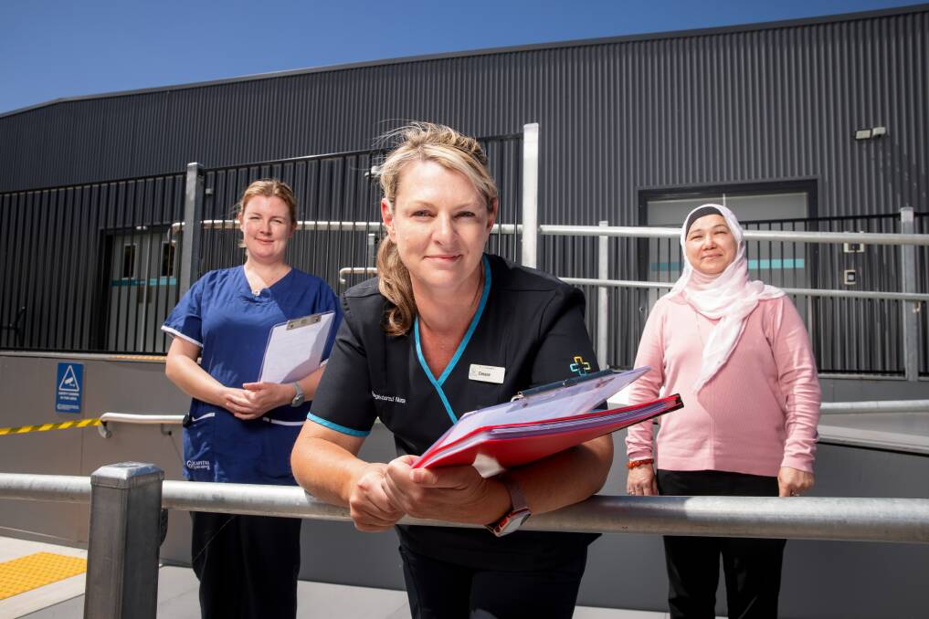 Staffing the COVID-19 vaccine rollout at the Garran Surge Centre will be clinical nurse consultant Kimberley Phelan, registered nurse Cimone Gray, and operation admin Bibi Kazmi. Picture: Sitthixay Ditthavong