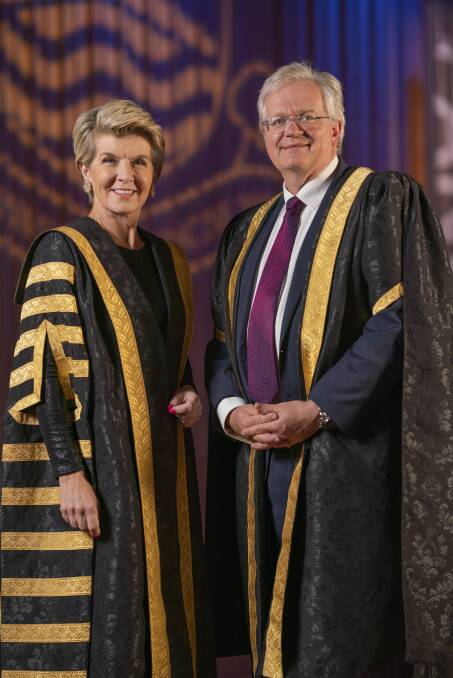 The Australian National University's chancellor, Julie Bishop, congratulates Brian Schmidt on his reappointment as vice-chancellor. Picture: Lannon Harley/ANU