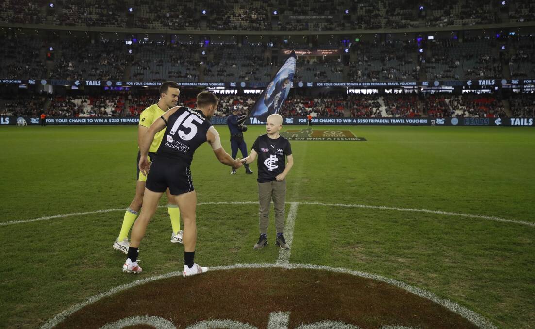 Zac Minty does the coin toss at the April 24 game. Picture: Supplied